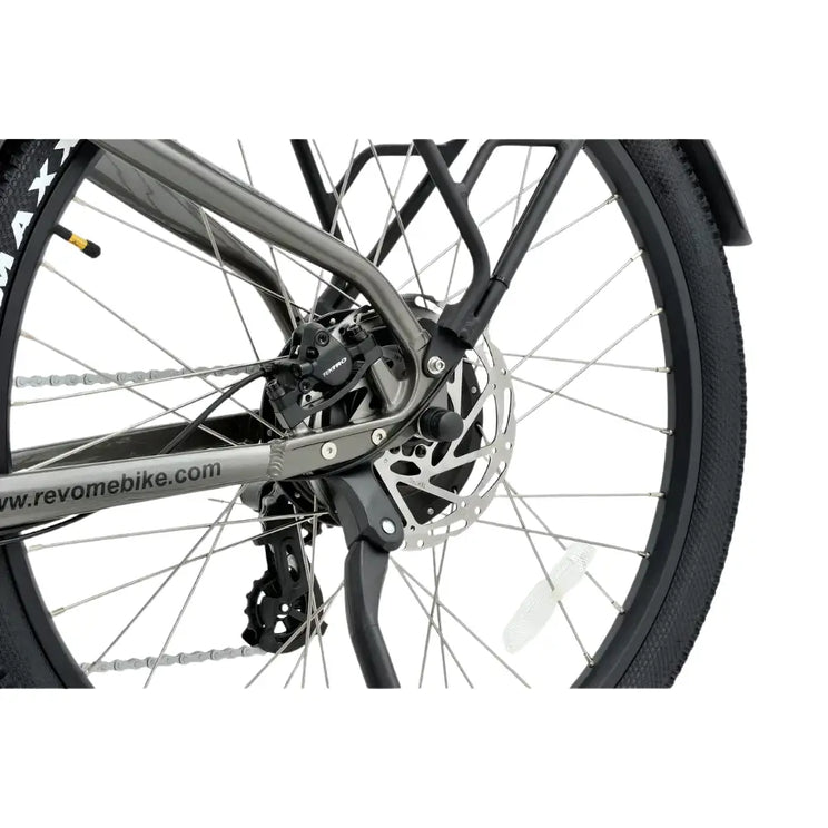 Close-up of the Revom U2 All-Terrain electric bike rear disc brake and gear system.