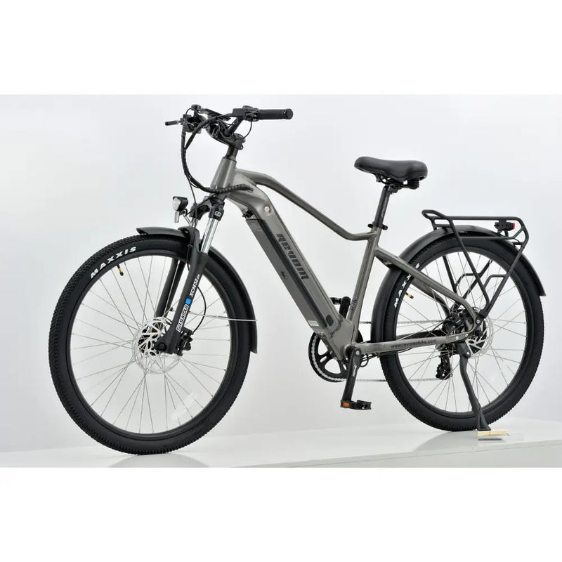 Side angle view of the Revom U2 All-Terrain electric bike in dark grey with front suspension and rear rack.