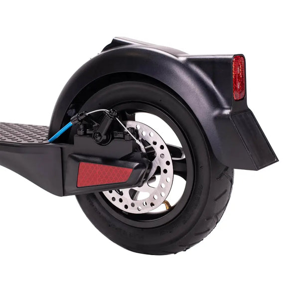 Rear wheel of Riley RS1 V2 electric scooter showing disc brake and reflector.