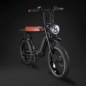 Rocket 88S Fat Boy electric bike displayed with a vibrant brown leather bench seat and black off-road tires.