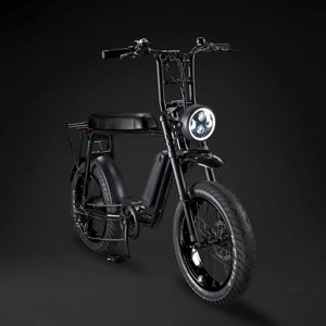 Front angle view of the all-black Rocket 88S Fat Boy electric bike featuring high-rise handlebars and a long bench seat.