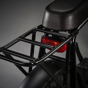 Detail shot of the black rear cargo rack and brake light on the Rocket 88S Fat Boy.