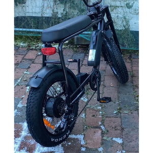 Rear side view of the Rocket 88X Special Edition Fat Boy e-bike showing battery placement, fat tyres, and taillight, designed for rugged off-road terrain.