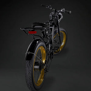 Rear view of the Rocket GTS 350W e-bike featuring a black seat and distinctive gold wheels.