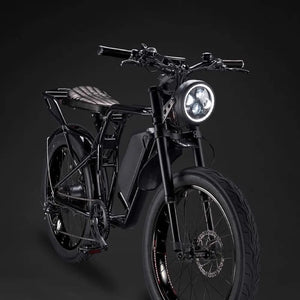 Rocket GTS Cruiser electric bike displayed with matte black rims and a black leather seat.
