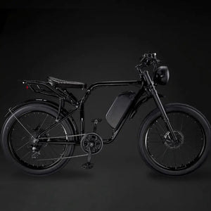 Side profile of the retro-style Rocket GTS e-bike equipped with black rims and a black seat.