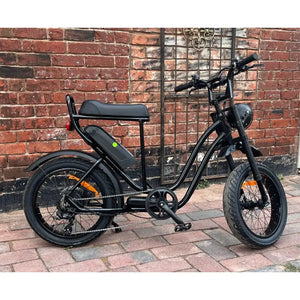 Rocket ST step-through fat tyre electric bike 250W side view on concrete ground