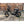 Rocket ST step-through electric bike with fat tyres and rear hub motor parked outdoors