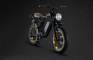 Black electric bike with gold wheels on a dark background