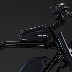 Detail shot of the "Wild Man" waterproof hard-shell storage bag mounted on the black Rocket X frame.