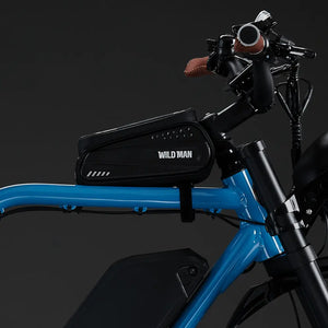 Detail shot of the "Wild Man" waterproof hard-shell storage bag mounted on the blue Rocket X frame.