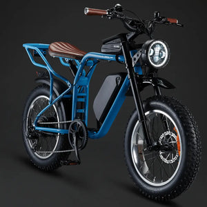Front view of the Rocket X Sport Utility e-bike in blue, featuring a headlight grill and front suspension.