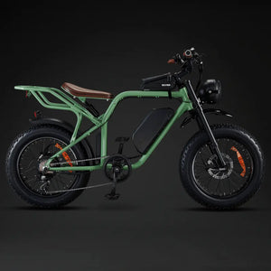 Full side profile of the Rocket X Sport Utility electric bike in racing green, showcasing the step-over frame and fat tires.