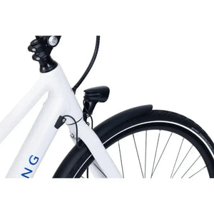 Close-up view of the Viking Urban Eco Comfort step-through electric bike’s front fork, light, and fender for enhanced visibility and protection.