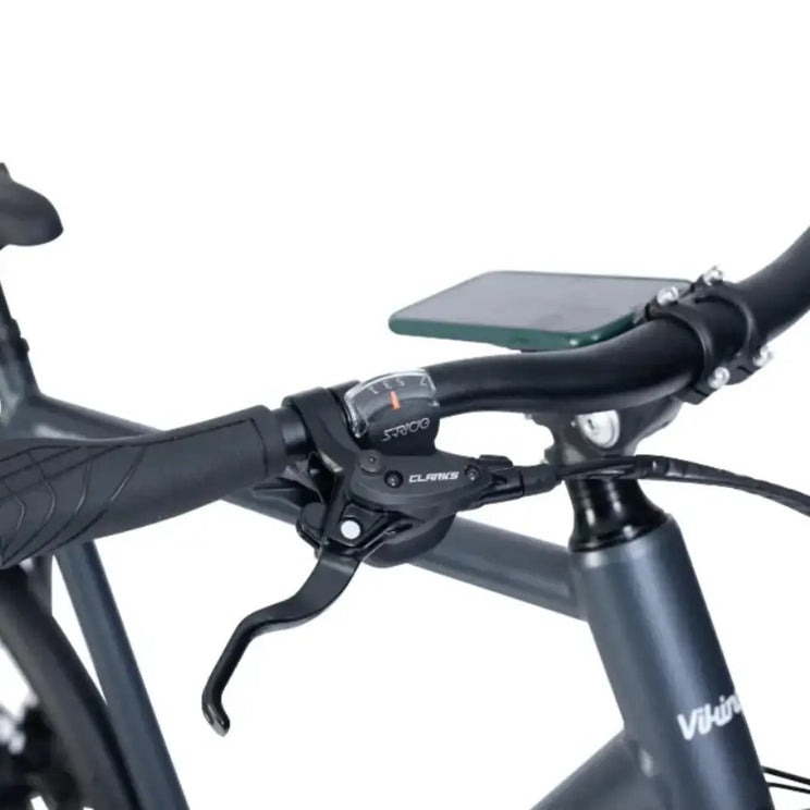 Close-up of Viking Urban Eco Sport electric bike handlebar with gear shifters and brake levers.
