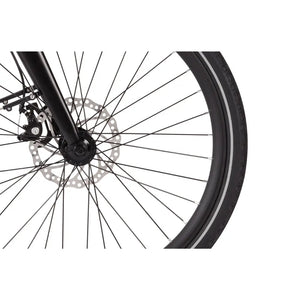 Close-up of the front disc brake system and wheel spokes on the Wisper 705 26" Step Through Electric Bike 250W, highlighting the braking mechanism and tyre.