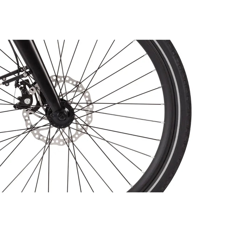 Close-up of the front disc brake system and wheel spokes on the Wisper 705 26" Step Through Electric Bike 250W, highlighting the braking mechanism and tyre.