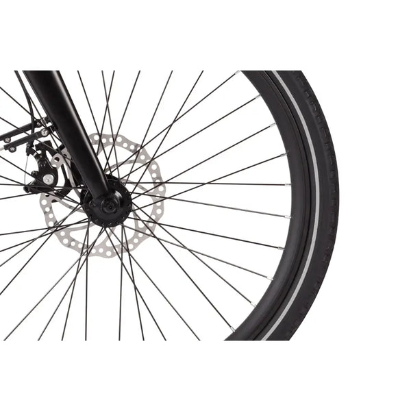 Close-up of the front disc brake system and wheel spokes on the Wisper 705 24" Step Through Electric Bike 250W, highlighting the braking mechanism and tyre.